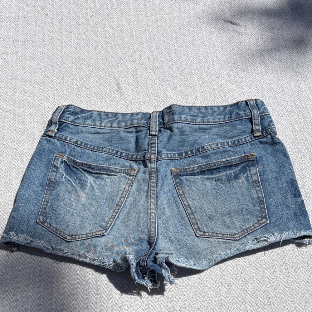 Free People Distressed Light Blue Denim Cutoff Shorts.  Size 28